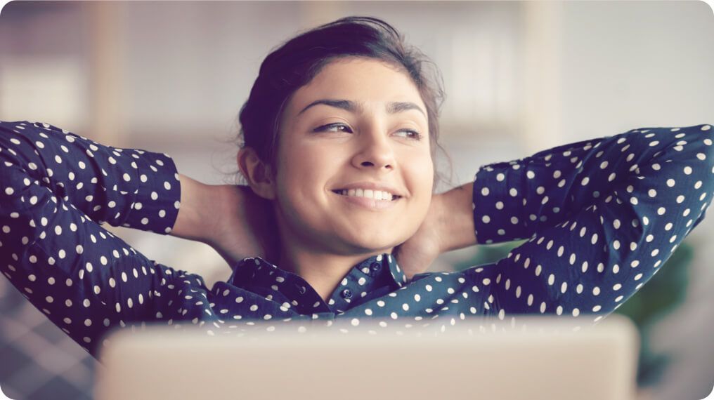 Photo of a person happy and relaxed at work