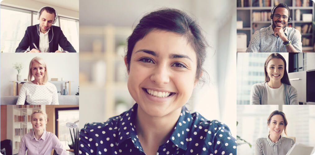 Photo of people smiling and happy at work