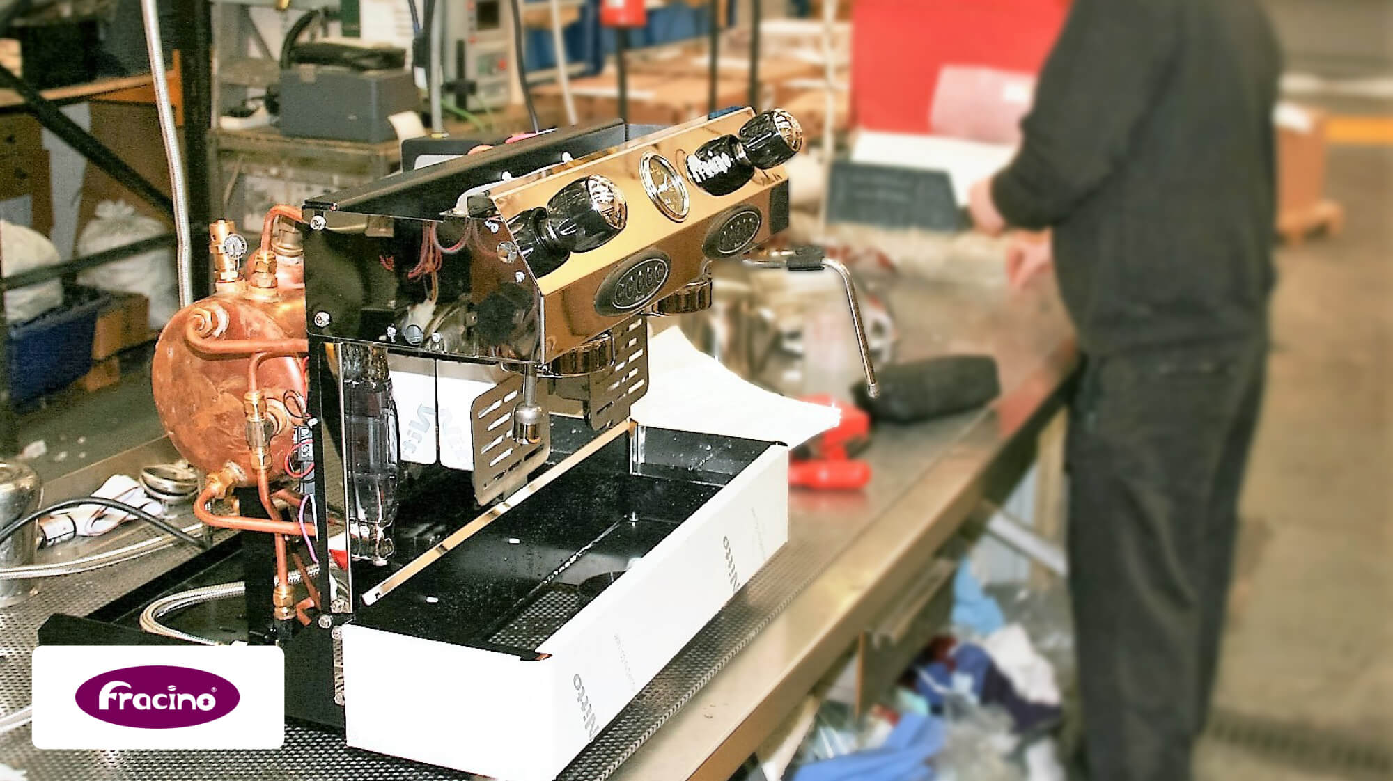 Photo of a Fracino employee building a coffee machine